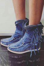 Suede moccasin boots with fringes