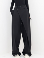 Trendy asymmetric trousers with wide legs