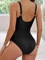 One-piece bikini with twisted front